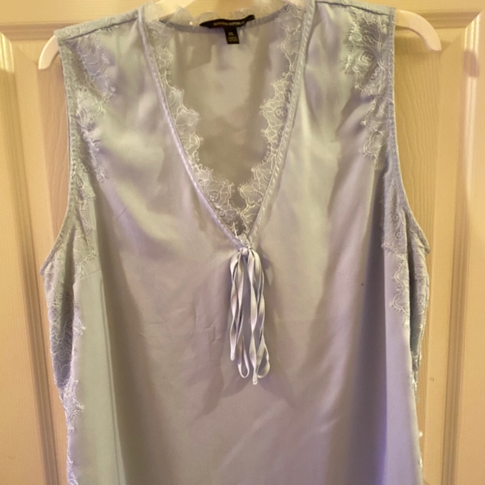 Silky, light blue blouse with lace detail